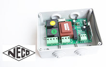 Load image into Gallery viewer, Neco remote control kit mk1 with two handsets/keyfobs for roller shutters and garage doors showing circuit board and connections
